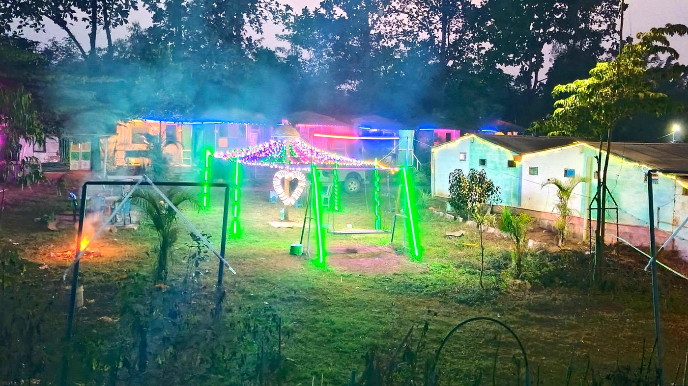 Bonfire and fairy lights on the resort lawn
