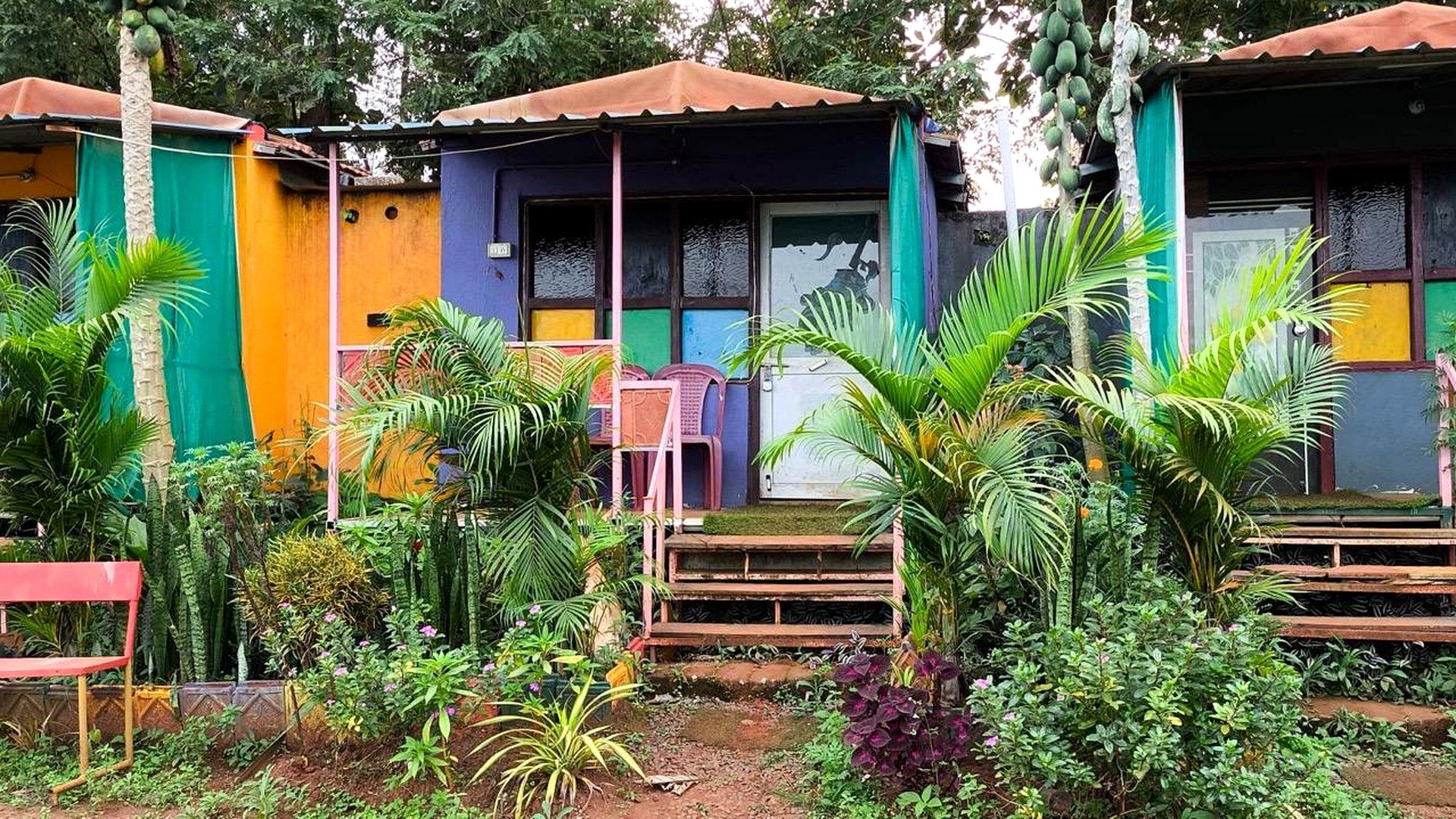 Colourful valley-view cottages at Rayudu Resort's