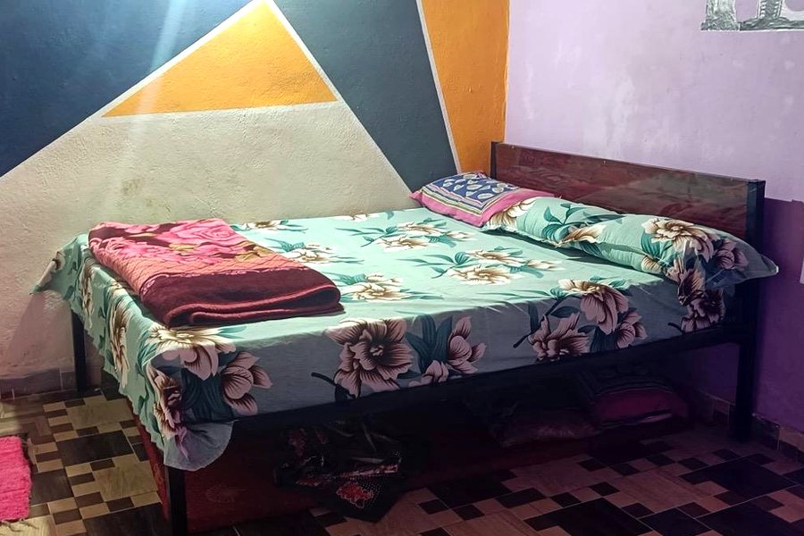 Double bed and hand-painted walls